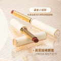 Gilt leather stiletto lipstick